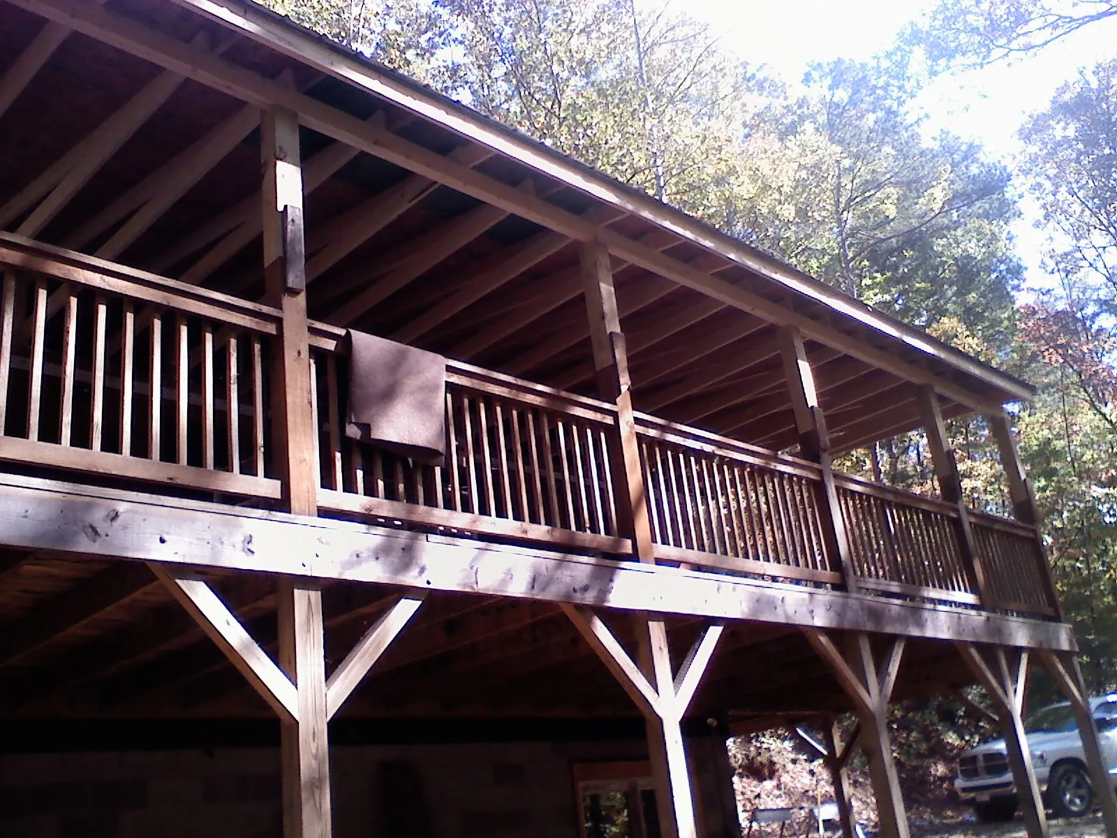 Timber framing under a new elevated porch and deck — Roof Leak Repair in Newton Upper Falls by Roofing Brothers